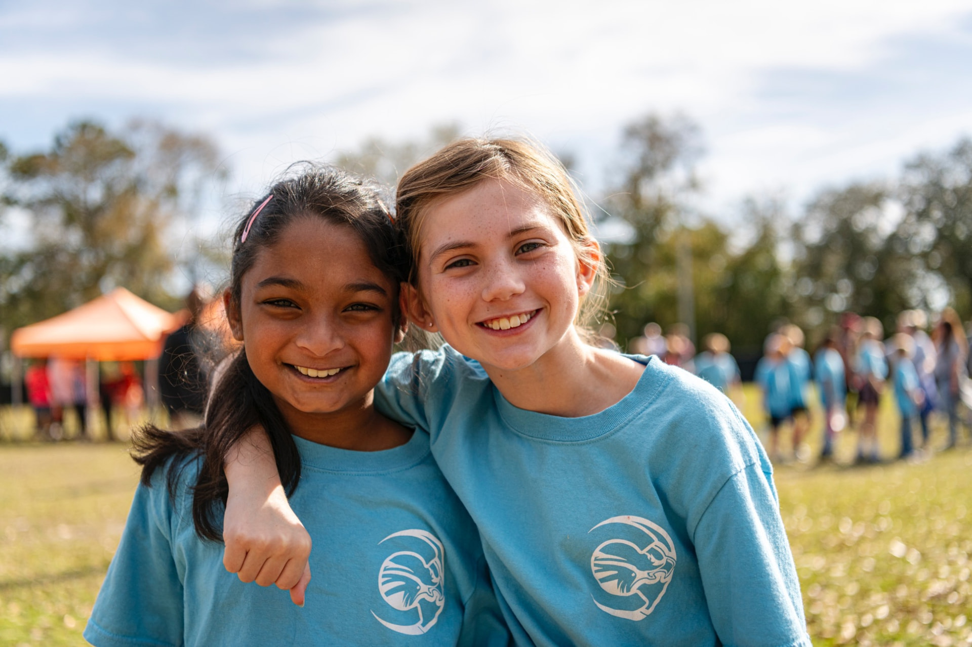Two CCA students smiling together at Field Day